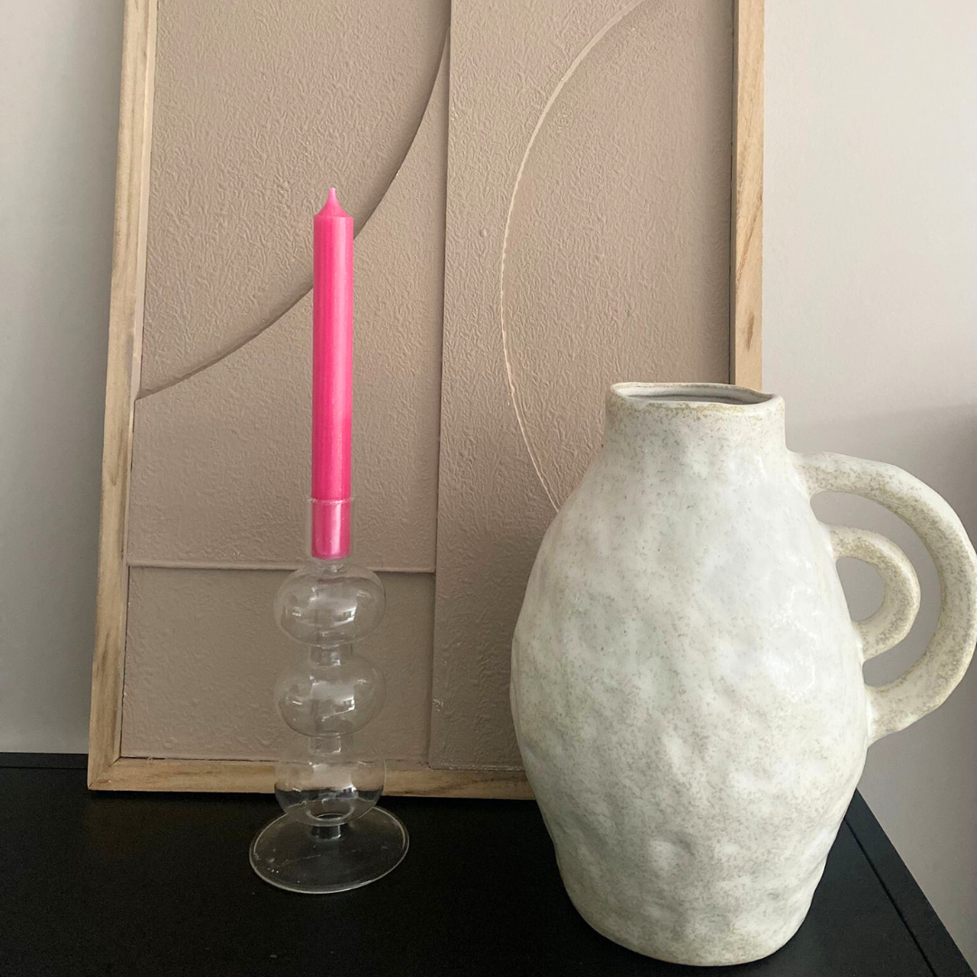 Neon pink dinner candle